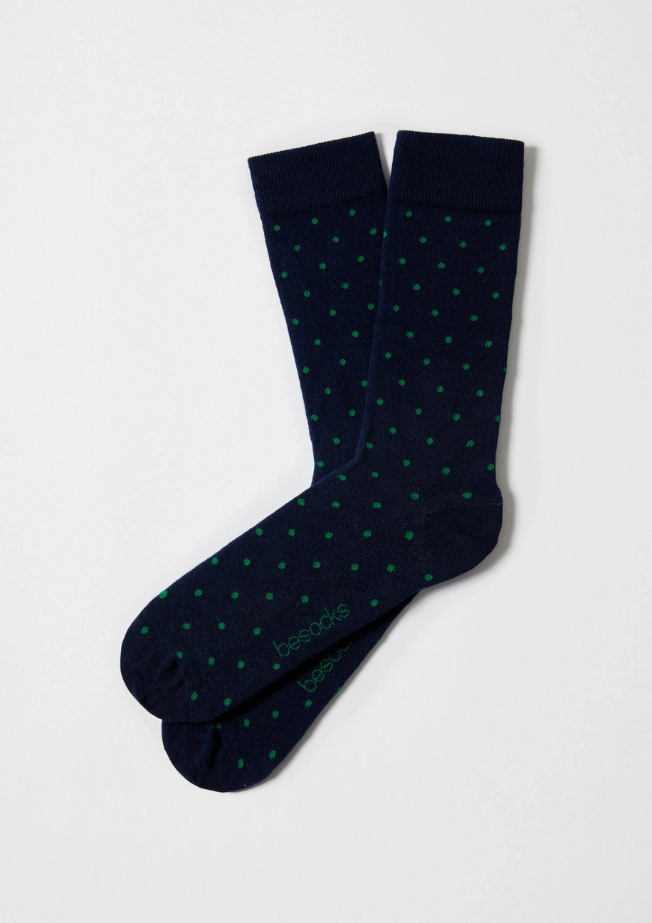 Roheliste täppidega tumesinised sokid